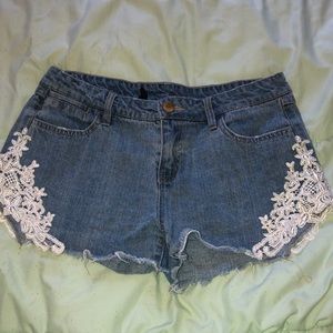 Blue jean shorts with lace detail